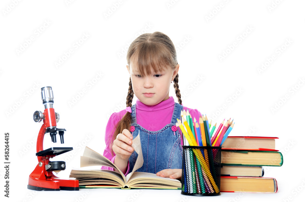 The little girl learn isolated on white background The little girl learn isolated on white background