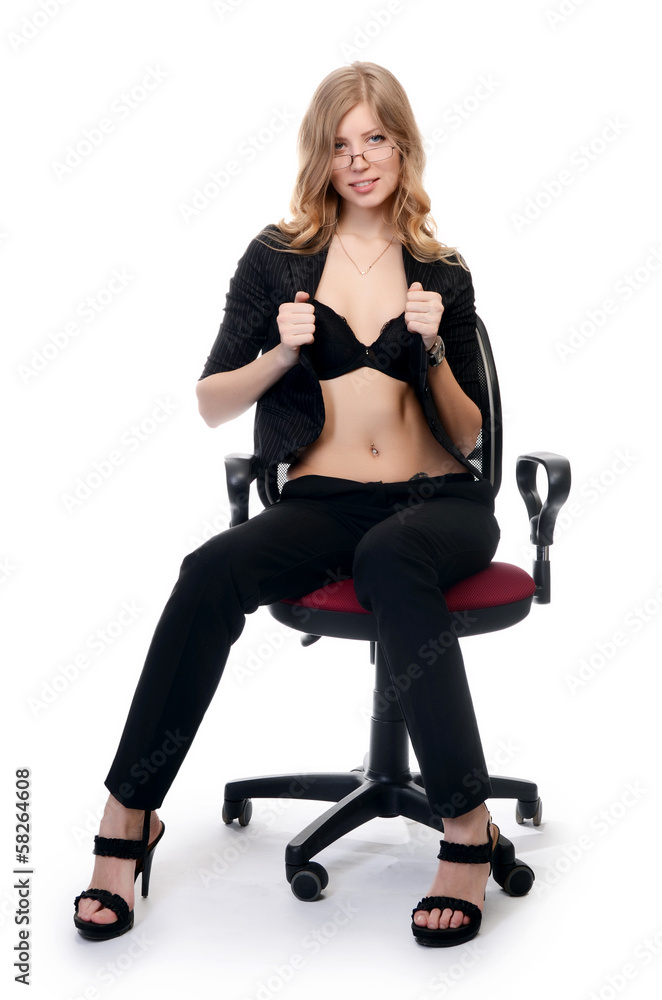 Fototapeta premium Businesswoman in an armchair isolated on white background