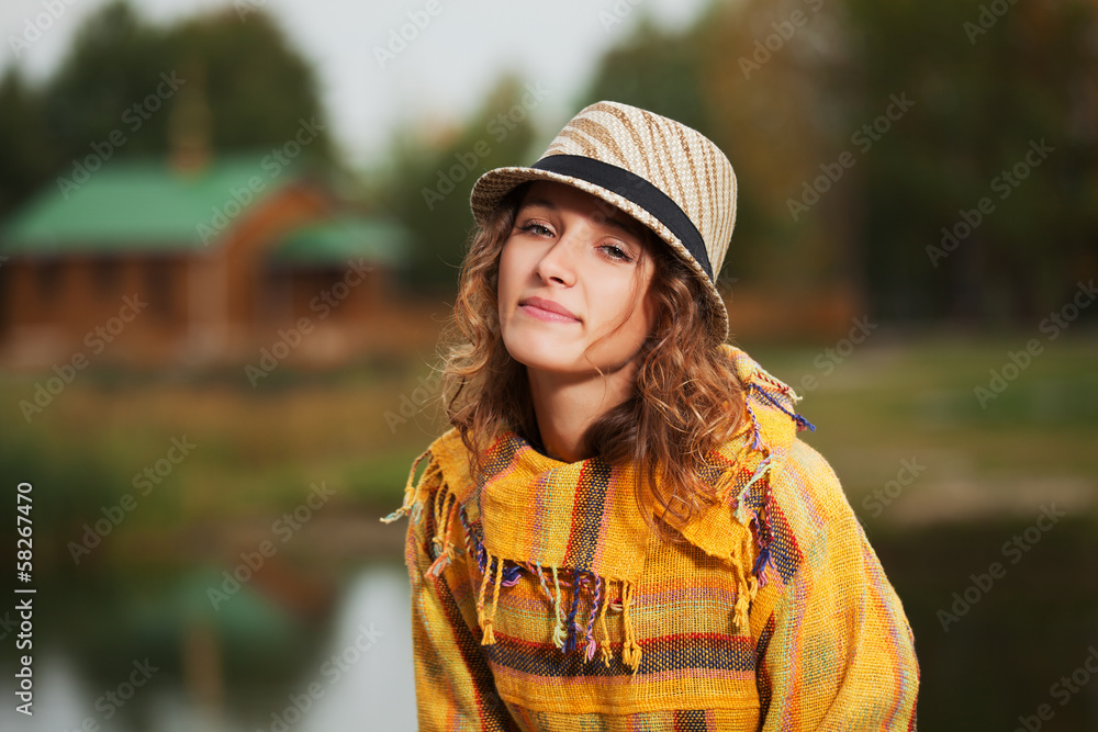 Young rastafarian woman in autumn park Young rastafarian woman in autumn park