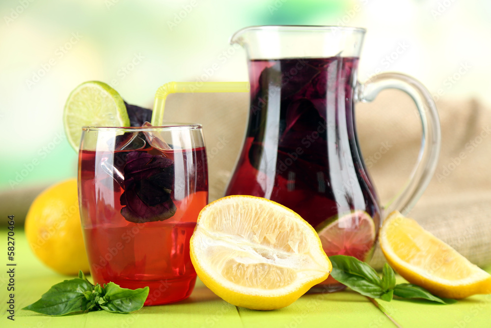 Fototapeta premium Red basil lemonade in jug and glass,