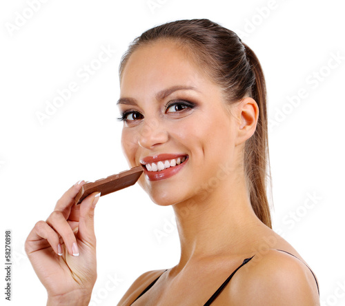 Portrait of beautiful young girl with chocolate isolated