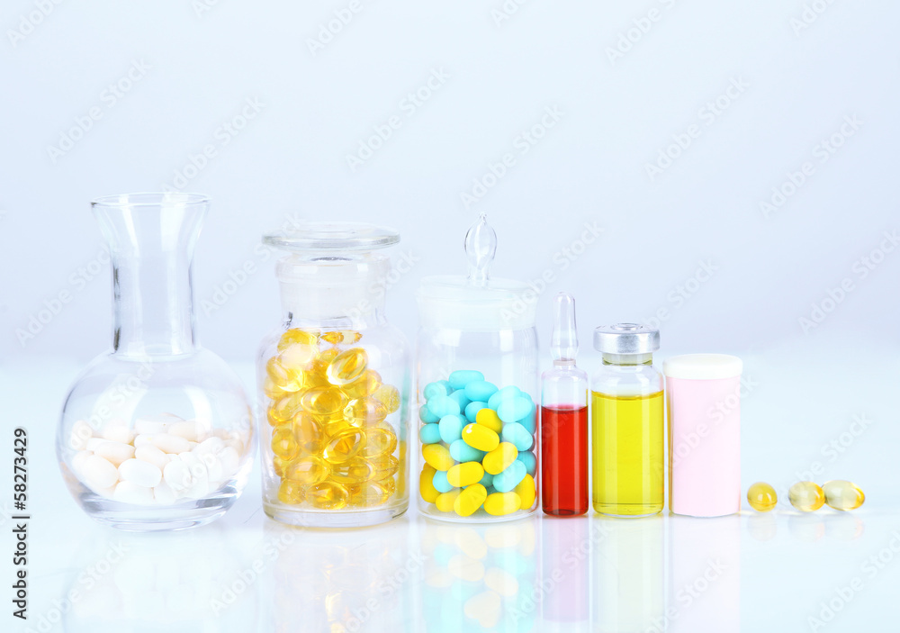 Medical bottles and pills isolated on white Medical bottles and pills isolated on white