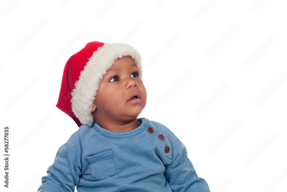 Funny african baby with Christmas hat Funny african baby with Christmas hat