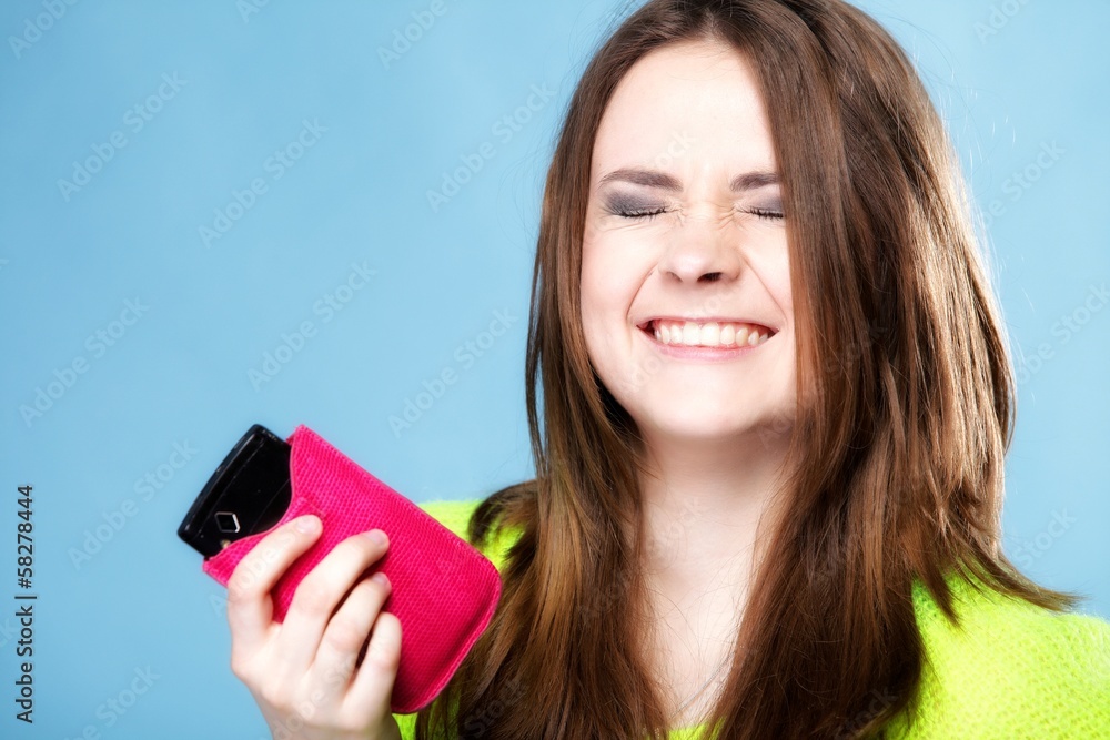 Naklejka premium Happy girl with mobile phone in pink cover