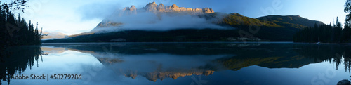 Panoramic Image Of Lucerne Peak Lit by the Rising Sun Reflected