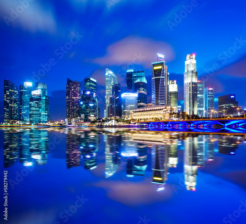 Urban cityscape in Singapore at night © leungchopan