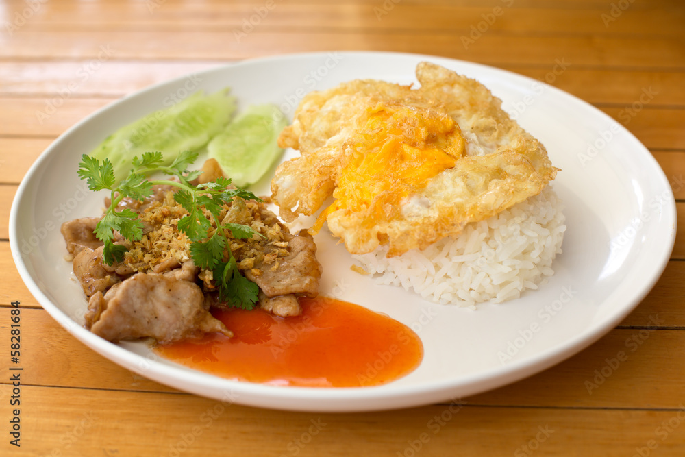 fried pork with garlic and pepper on rice fried pork with garlic and pepper on rice