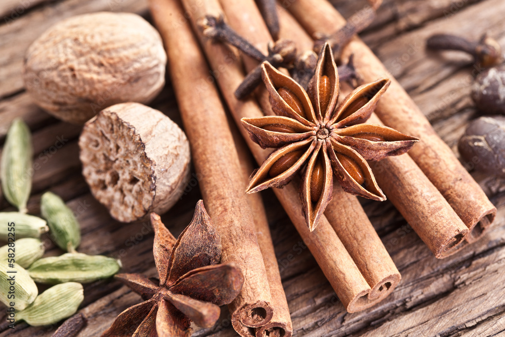 Spices on a old wooden table. Spices on a old wooden table.