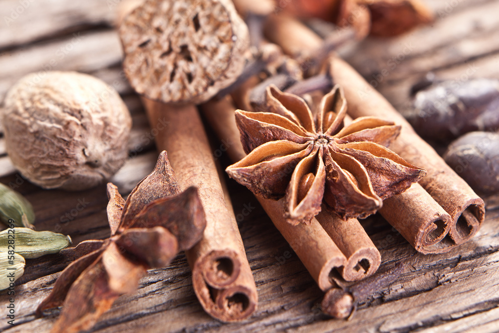 Spices on a old wooden table. Spices on a old wooden table.