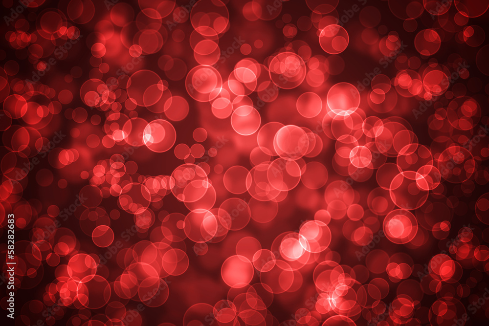 Red glowing bokeh holiday background Red glowing bokeh holiday background