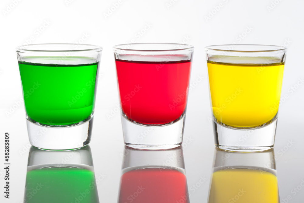 a few glasses of alcoholic drinks in red green yellow a few glasses of alcoholic drinks in red green yellow