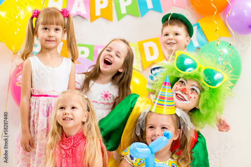 jolly kids group and clown on birthday party
