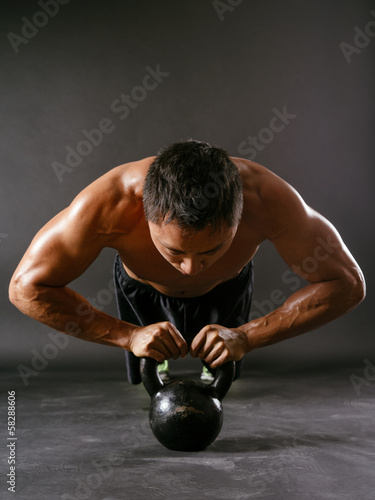 Pushups with kettlebell