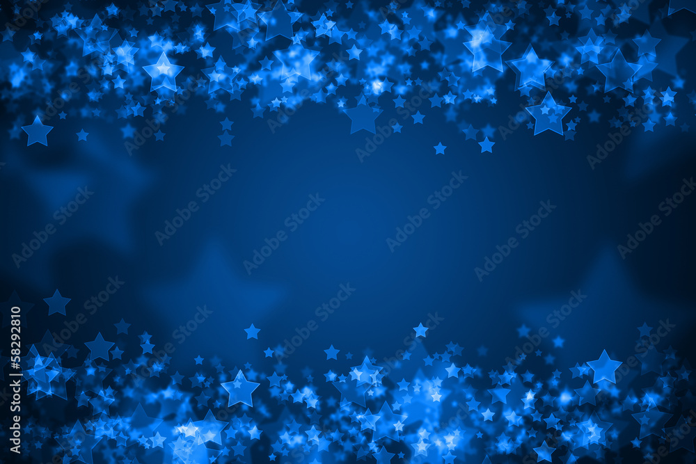 Blue glowing bokeh holiday background