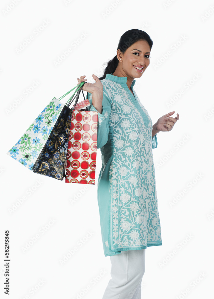 Woman carrying shopping bags