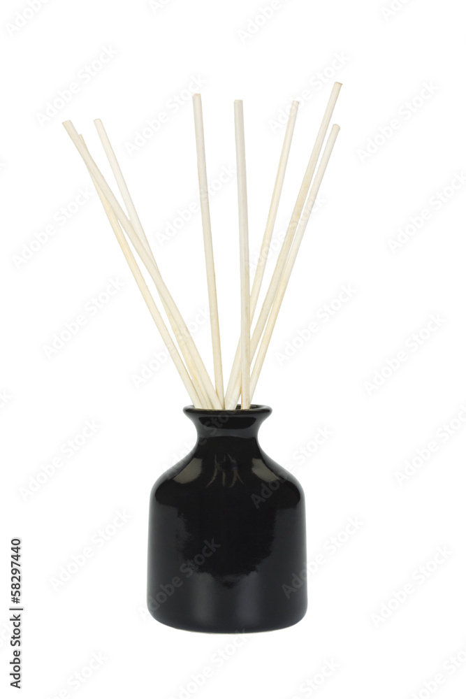Close-up of a flower pot with incense sticks Close-up of a flower pot with incense sticks