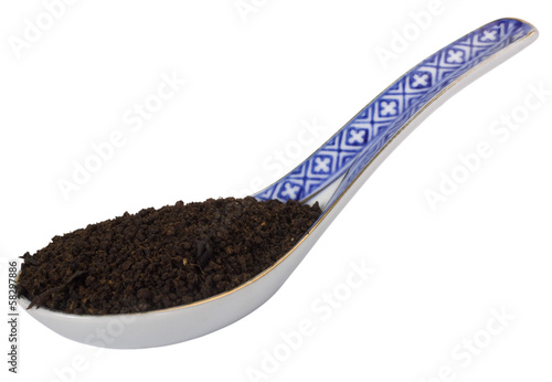 Photography Close-up of a spoon full of dried tea leaves