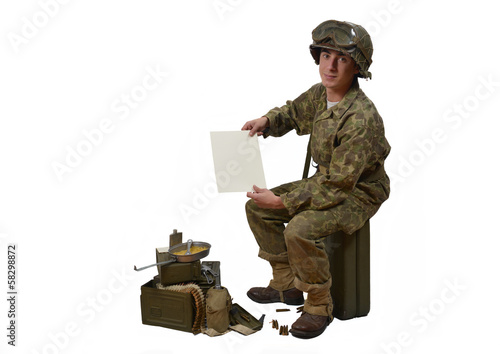 young American soldier shows a letter