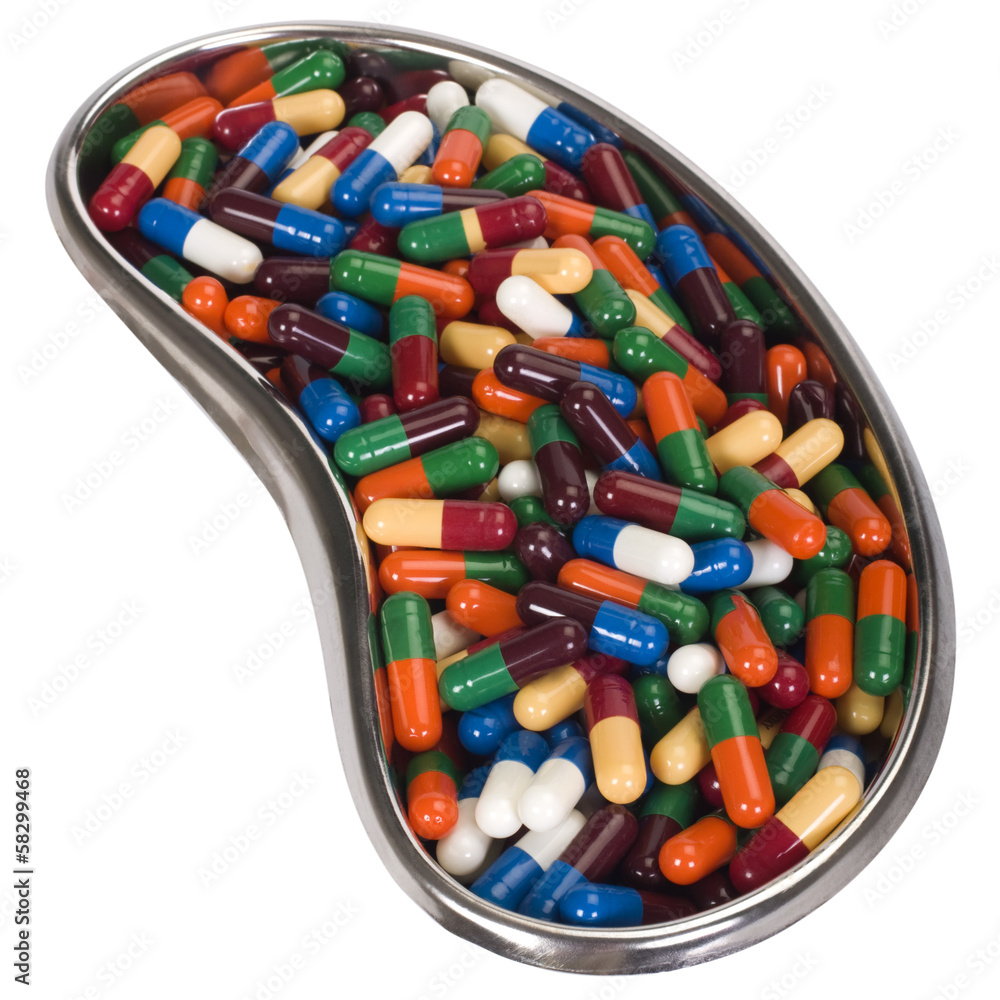 Close-up of capsules in a kidney dish Close-up of capsules in a kidney dish