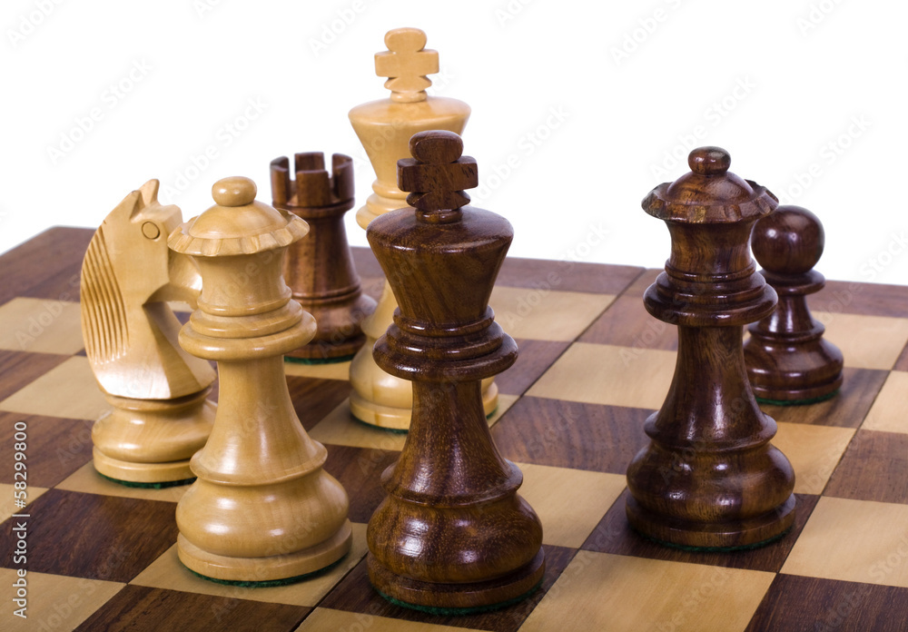 Chess pieces on a chessboard Chess pieces on a chessboard