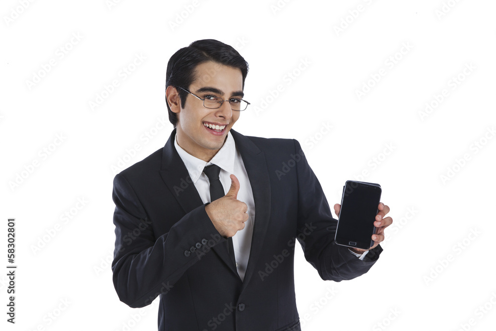 Businessman showing a mobile phone Businessman showing a mobile phone