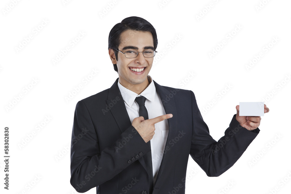 Portrait of a businessman showing a blank business card Portrait of a businessman showing a blank business card