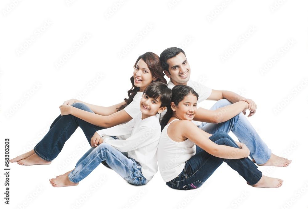 Portrait of a happy family sitting together Portrait of a happy family sitting together