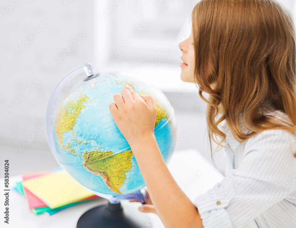 curious student girl with globe at school curious student girl with globe at school
