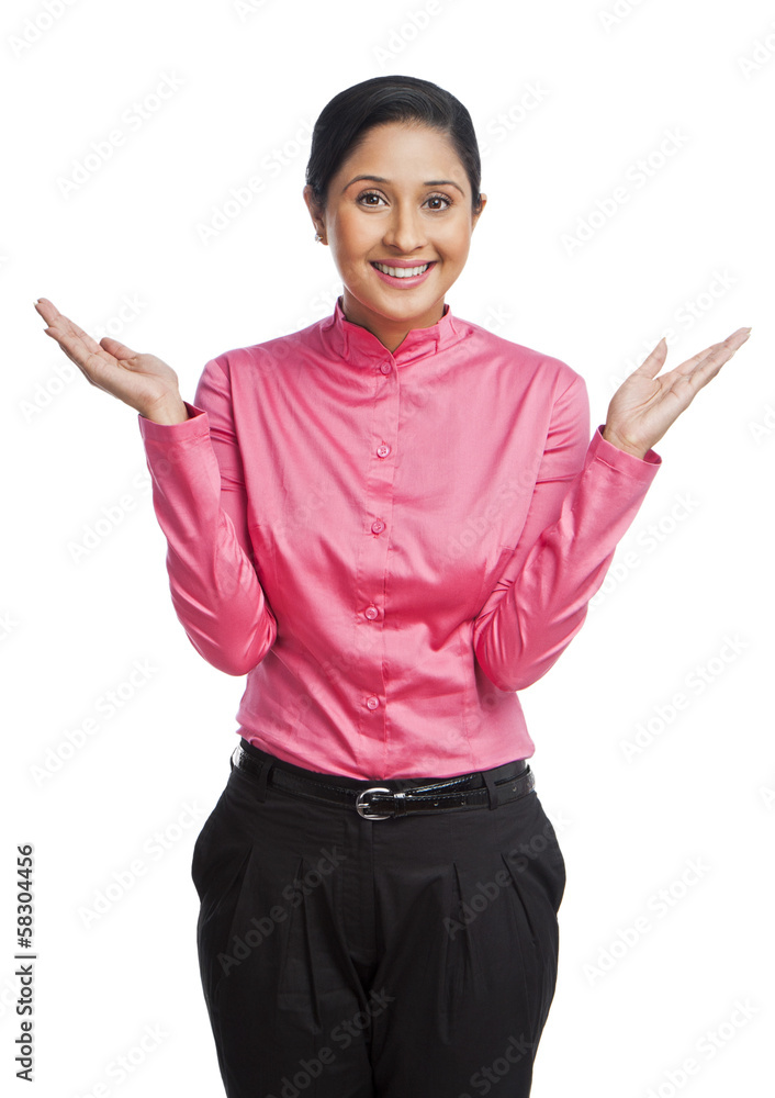 Portrait of a businesswoman gesturing and smiling Portrait of a businesswoman gesturing and smiling