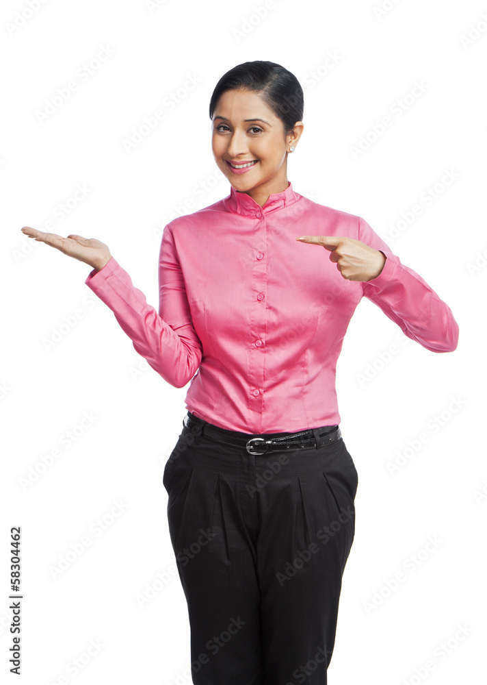 Portrait of a businesswoman gesturing and smiling Portrait of a businesswoman gesturing and smiling