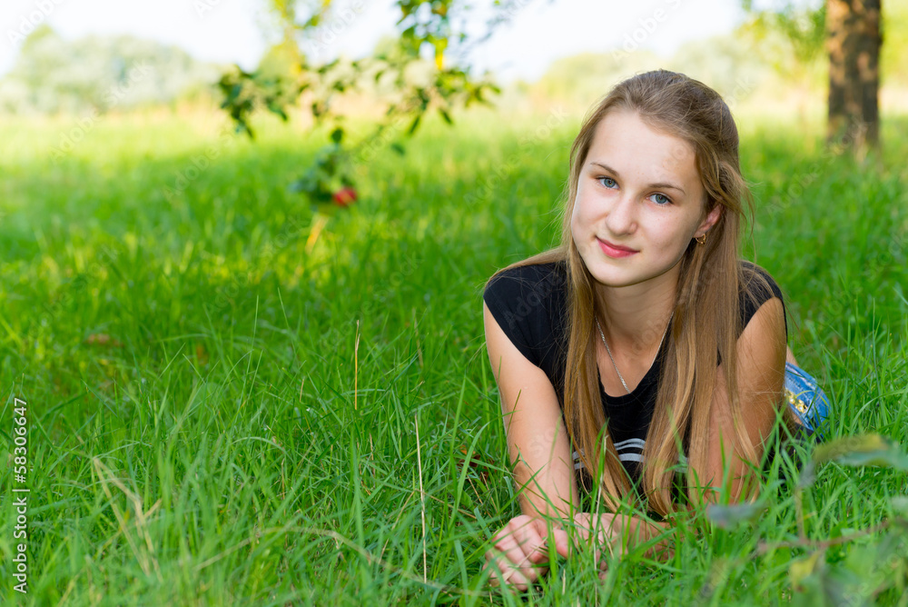 Young girl is resting in nature Young girl is resting in nature