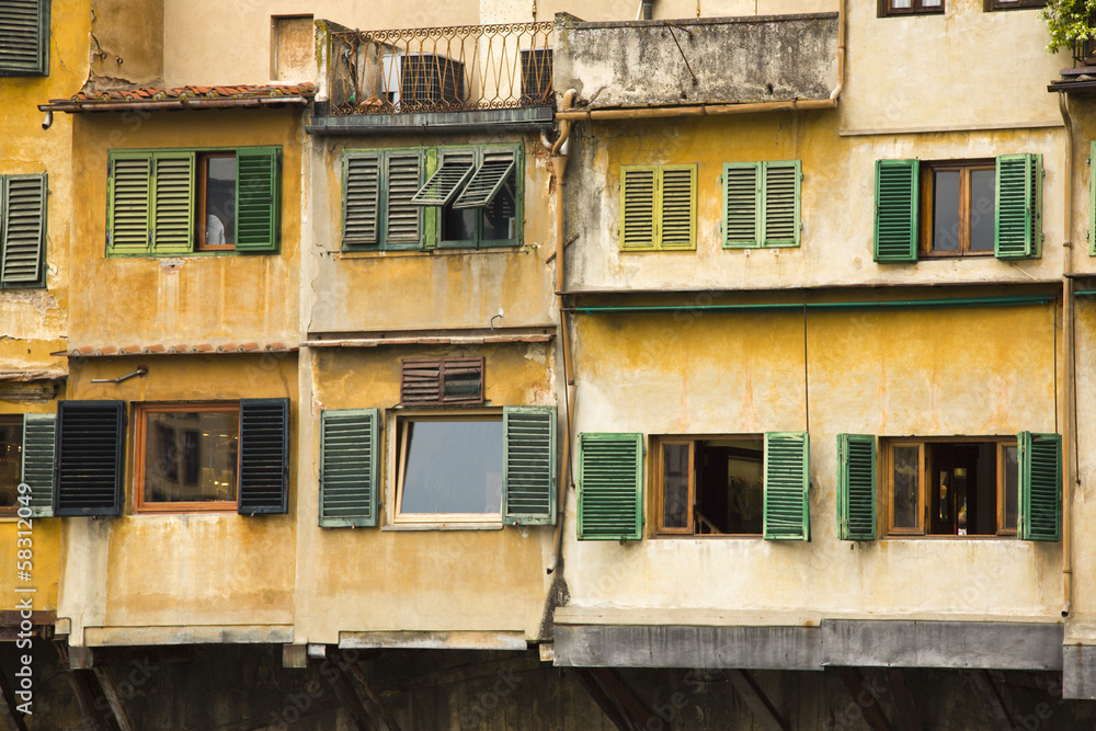 Low angle view of windows of a building, Florence, Tuscany, Italy