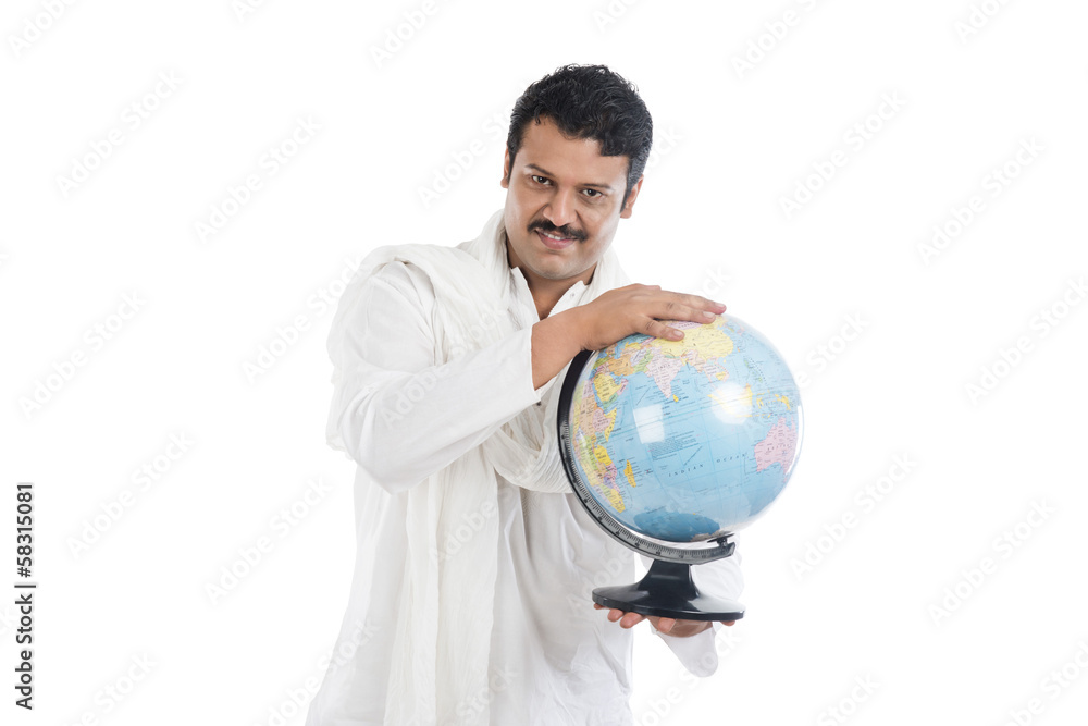 Portrait of a man holding a globe Portrait of a man holding a globe