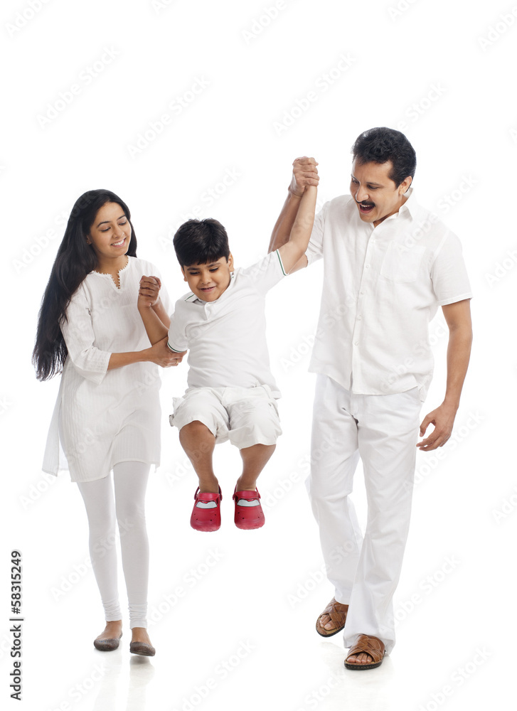 Couple having fun with their son Couple having fun with their son