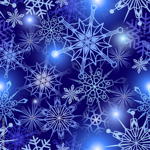 Seamless vector pattern with snowflakes and sparkles