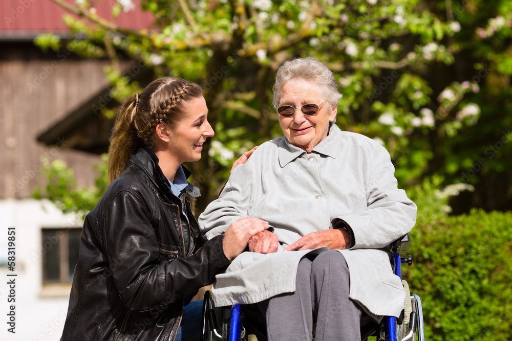 woman visiting grandmother in nursing home
