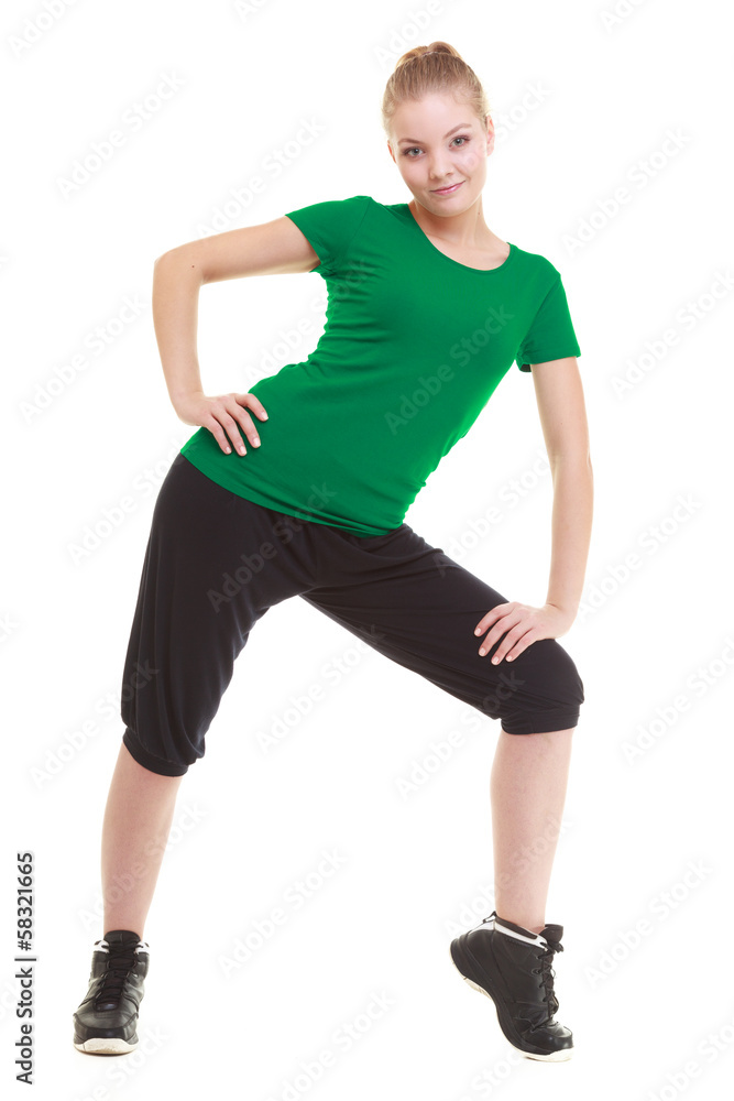 young sporty girl doing stretching exercise isolated