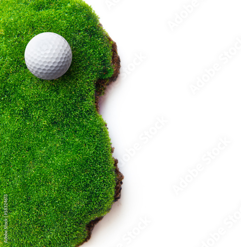 Fototapeta Golf ball on green grass field.