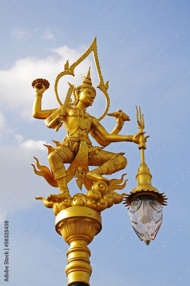 A golden thai angel lighting pole, Thai style statue