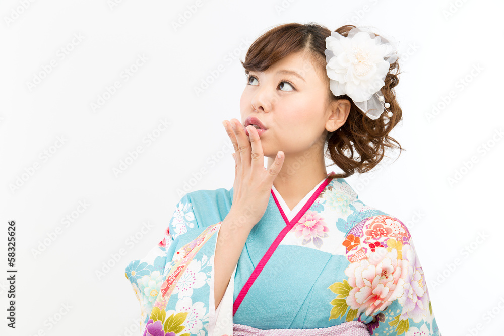 Beautiful asian kimono woman on white background Beautiful asian kimono woman on white background