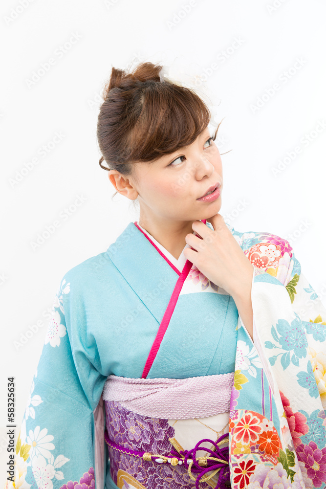 Beautiful asian kimono woman on white background Beautiful asian kimono woman on white background