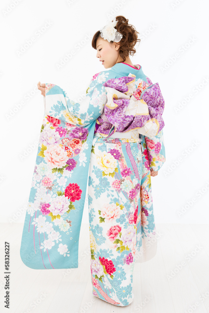 Beautiful asian kimono woman on white background Beautiful asian kimono woman on white background