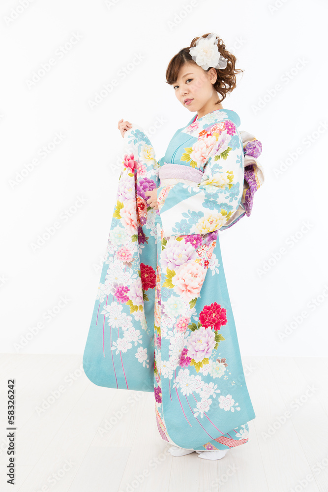 Beautiful asian kimono woman on white background Beautiful asian kimono woman on white background