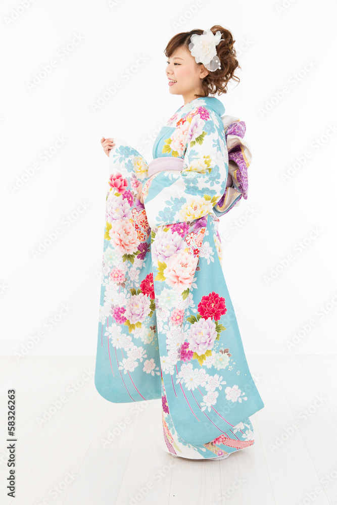 Beautiful asian kimono woman on white background Beautiful asian kimono woman on white background
