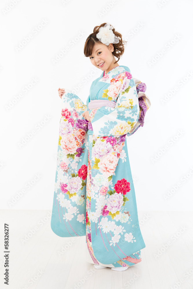 Beautiful asian kimono woman on white background Beautiful asian kimono woman on white background