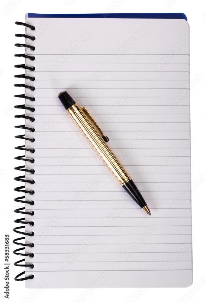 Close-up of a ballpoint pen on a spiral notebook Close-up of a ballpoint pen on a spiral notebook