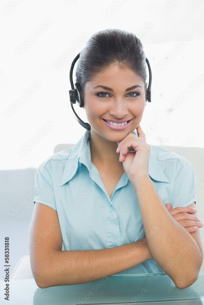 Close up portrait of businesswoman wearing headset Close up portrait of businesswoman wearing headset