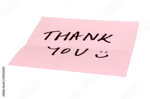 Text Thank You written on an adhesive note