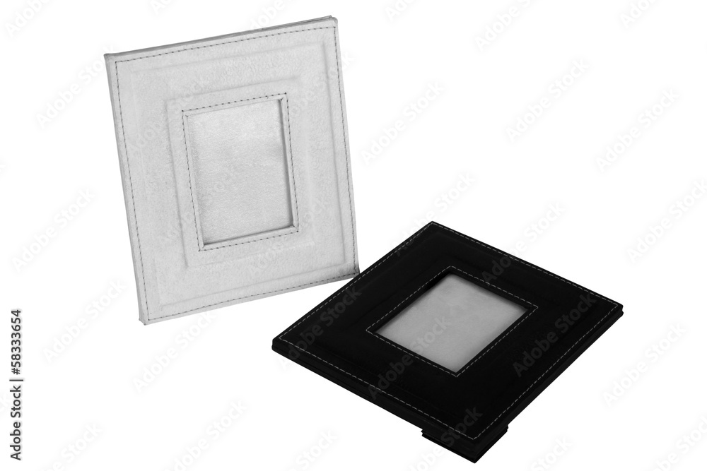 Close-up of two empty photo frames