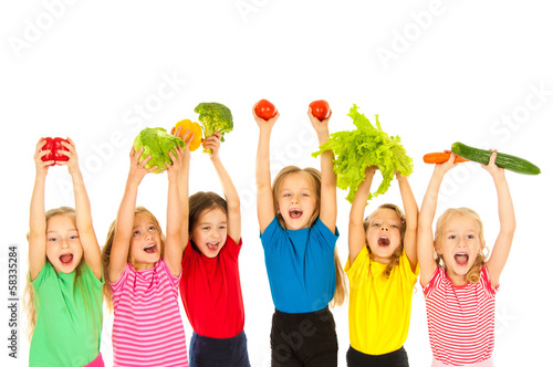 Children  with vegetables #58335284